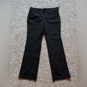 Daisy Fuentes, mid rise, boot cut, black ponte pants. Size Large NWT